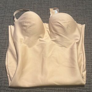 Skims body zoned underwire mid thigh bodysuit. $138 value